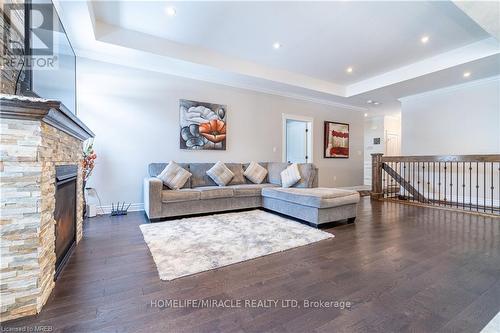 1 Drake Crt, Strathroy-Caradoc, ON - Indoor Photo Showing Living Room With Fireplace