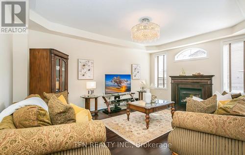 60 Impulse Circle, Brampton, ON - Indoor Photo Showing Living Room With Fireplace