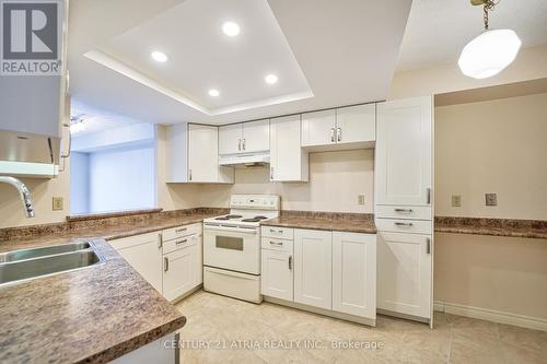 #1505 -1360 Rathburn Rd E, Mississauga, ON - Indoor Photo Showing Kitchen With Double Sink