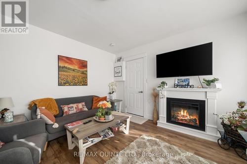 598 Swamp College Rd, Prince Edward County, ON - Indoor Photo Showing Living Room With Fireplace
