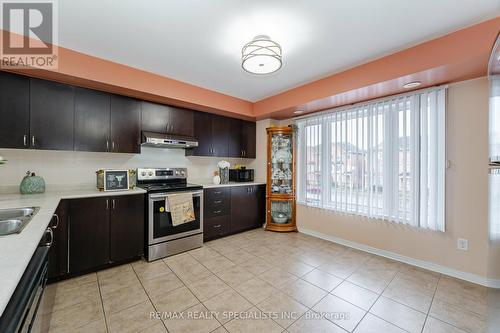 #63 -60 Fairwood Circ, Brampton, ON - Indoor Photo Showing Kitchen With Stainless Steel Kitchen With Double Sink