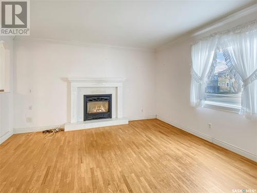828 Temperance Street, Saskatoon, SK - Indoor Photo Showing Living Room With Fireplace