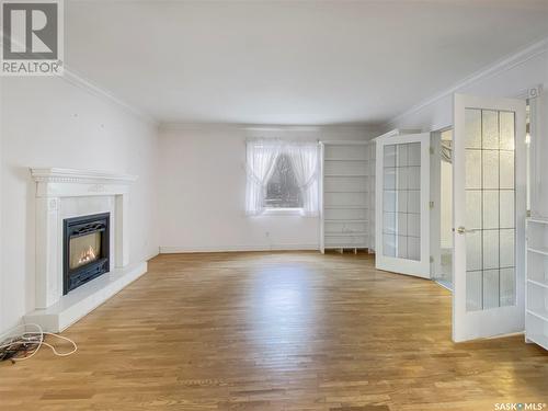 828 Temperance Street, Saskatoon, SK - Indoor Photo Showing Living Room With Fireplace