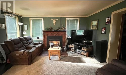 6 Ellis, Leamington, ON - Indoor Photo Showing Living Room With Fireplace