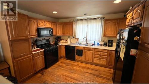 6 Ellis, Leamington, ON - Indoor Photo Showing Kitchen With Double Sink