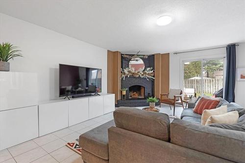 39 Pheasant Place, Hamilton, ON - Indoor Photo Showing Living Room With Fireplace