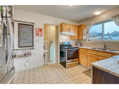 122 Woodlands Place, Penticton, BC - Indoor Photo Showing Kitchen With Double Sink