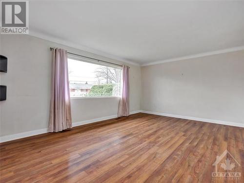 Living room with large windows - 5961 Perth Street, Ottawa, ON - Indoor Photo Showing Other Room