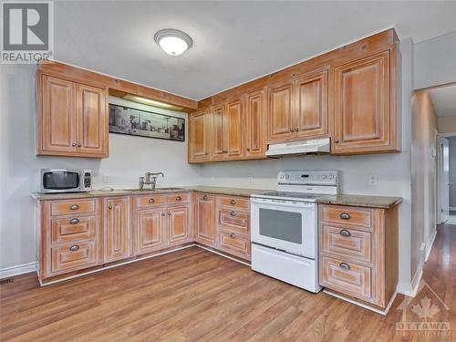 Kitchen with plenty of cabinets - 5961 Perth Street, Ottawa, ON - Indoor Photo Showing Kitchen