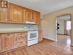 Kitchen, open to living and dining - 