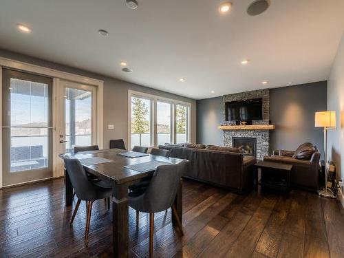 1710 Primrose Crt, Kamloops, BC - Indoor Photo Showing Dining Room With Fireplace