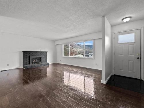 1951 Cardinal Drive, Kamloops, BC - Indoor Photo Showing Living Room With Fireplace