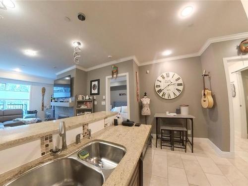 213-1325 Bear Mountain Pkwy, Langford, BC - Indoor Photo Showing Kitchen With Double Sink