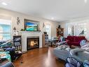 228 Saturna Dr, Qualicum Beach, BC  - Indoor Photo Showing Living Room With Fireplace 