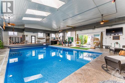 1831 Belval Crescent, Ottawa, ON - Indoor Photo Showing Other Room With In Ground Pool