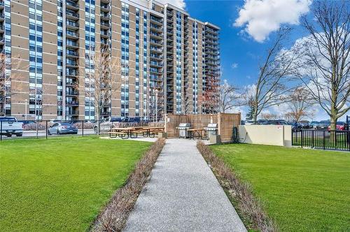 To the BBQ area - 301 Frances Avenue|Unit #203, Stoney Creek, ON - Outdoor With Facade