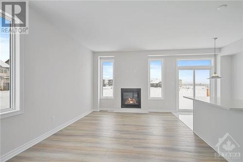 410 Fleet Canuck Private, Ottawa, ON - Indoor Photo Showing Living Room With Fireplace