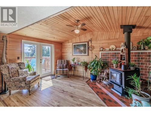 4939 Timothy Lake Road, Lac La Hache, BC - Indoor Photo Showing Living Room With Fireplace