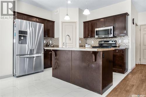 246 Ashworth Crescent, Saskatoon, SK - Indoor Photo Showing Kitchen With Upgraded Kitchen