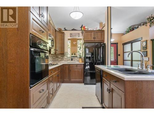 7688 Mountain Drive, Anglemont, BC - Indoor Photo Showing Kitchen With Double Sink