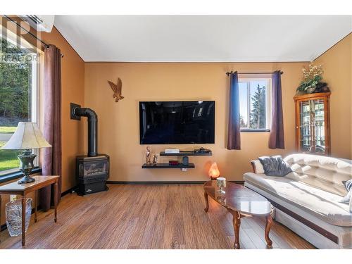 7688 Mountain Drive, Anglemont, BC - Indoor Photo Showing Other Room With Fireplace