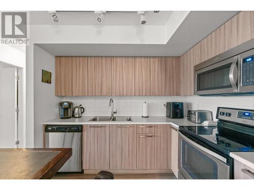 883 Academy Way Unit# Ph1, Kelowna, BC - Indoor Photo Showing Kitchen With Double Sink