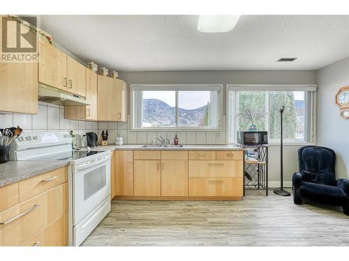12221 87Th Street, Osoyoos, BC - Indoor Photo Showing Kitchen With Double Sink