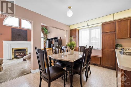 60 Dewberry Crescent, Ottawa, ON - Indoor Photo Showing Dining Room With Fireplace