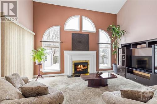 60 Dewberry Crescent, Ottawa, ON - Indoor Photo Showing Living Room With Fireplace