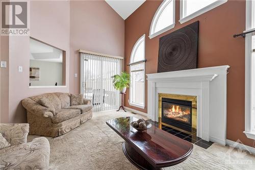 60 Dewberry Crescent, Ottawa, ON - Indoor Photo Showing Living Room With Fireplace