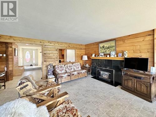 3456 Dunsmuir Road, Lac La Hache, BC - Indoor Photo Showing Living Room With Fireplace