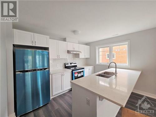 200 Anyolite Private, Ottawa, ON - Indoor Photo Showing Kitchen With Double Sink
