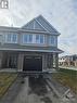 Actual property on premium end/corner lot.  Interior photos shown are of a similar model home, not the listed property. - 700 Pipit Lane, Ottawa, ON  - Outdoor With Facade 