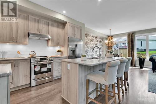 model home photos from a similar model  shown, listed property layout and features/finishes will vary.  Appliances not included in listed property - 700 Pipit Lane, Ottawa, ON - Indoor Photo Showing Kitchen With Upgraded Kitchen