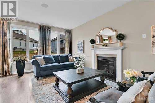700 Pipit Lane, Ottawa, ON - Indoor Photo Showing Living Room With Fireplace