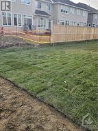 rear yard of actual property, has been sodded for a nice lawn next spring - 