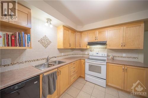 775 Brebeuf Street Unit#103, Casselman, ON - Indoor Photo Showing Kitchen With Double Sink