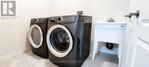 20 July Avenue, Hamilton, ON - Indoor Photo Showing Laundry Room