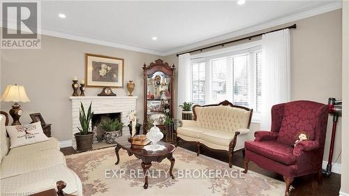 14 Rockingham Crt, London, ON - Indoor Photo Showing Living Room With Fireplace