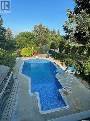 1670 Bader Crescent, Saskatoon, SK - Outdoor With In Ground Pool With Backyard
