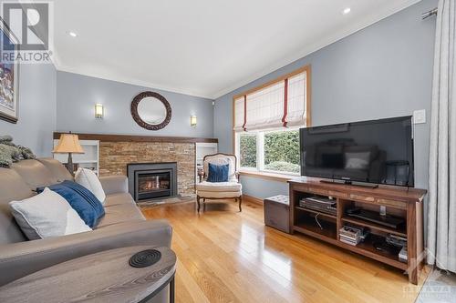 1798 Playfair Drive, Ottawa, ON - Indoor Photo Showing Living Room With Fireplace