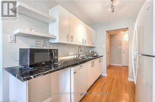 #1003 -95 Base Line Rd W, London, ON - Indoor Photo Showing Kitchen With Double Sink