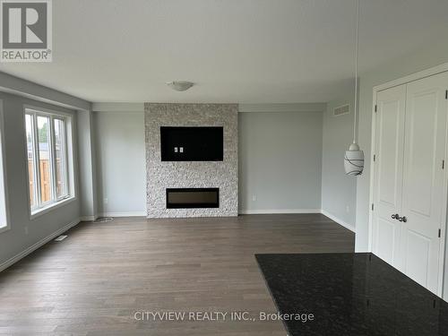 25 Hartfield St E, Ingersoll, ON - Indoor Photo Showing Living Room With Fireplace