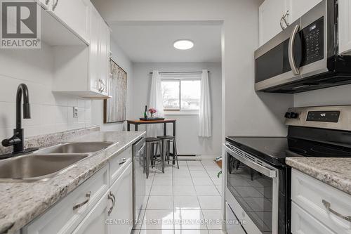 #78 -825 Dundalk Dr, London, ON - Indoor Photo Showing Kitchen With Double Sink