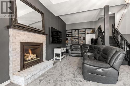 4 Woodland Rd, Central Elgin, ON - Indoor Photo Showing Living Room With Fireplace