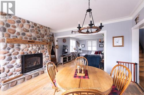151 King Street, Kawartha Lakes, ON - Indoor Photo Showing Dining Room With Fireplace