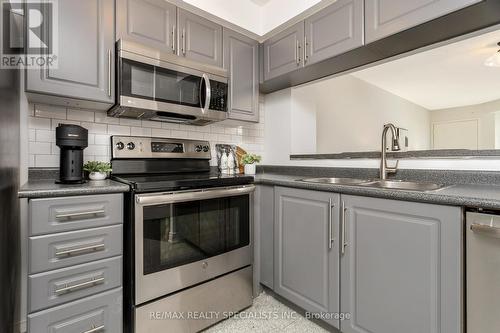 #806 -190 Manitoba St, Toronto, ON - Indoor Photo Showing Kitchen With Stainless Steel Kitchen With Double Sink
