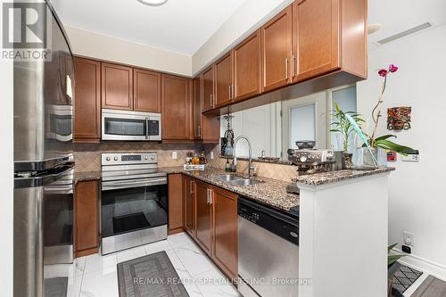 #Th119 -90 Absolute Ave, Mississauga, ON - Indoor Photo Showing Kitchen With Double Sink