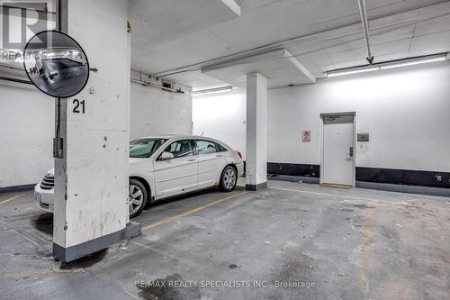 #Th119 -90 Absolute Ave, Mississauga, ON - Indoor Photo Showing Garage
