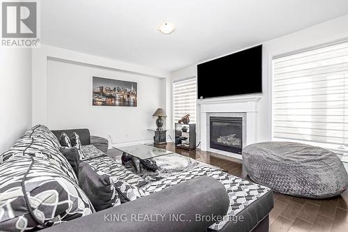 70 Monarch Dr, Halton Hills, ON - Indoor Photo Showing Living Room With Fireplace